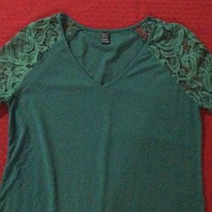 Dark green size medium woman’s shirt with lace sleeves, v neck